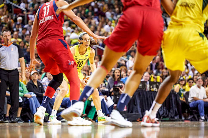 Sue Bird wearing a mask over her nose